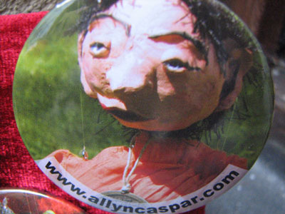 Button mit Chinese-Marionette